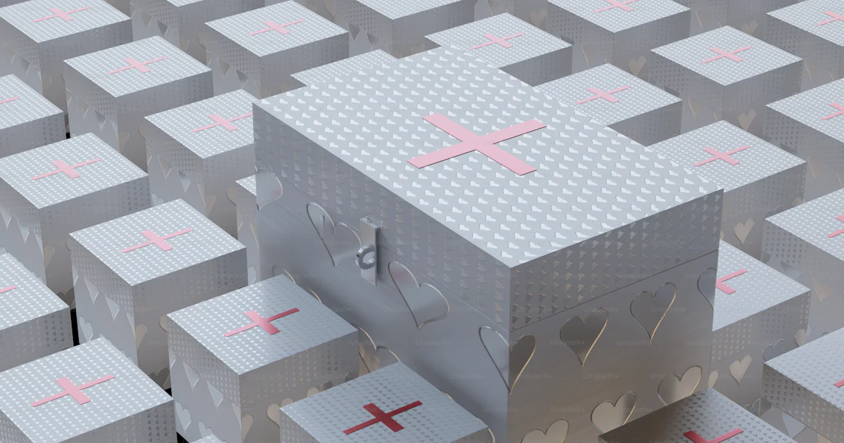 A box with a cross on it surrounded by smaller boxes photo – Trauma ...