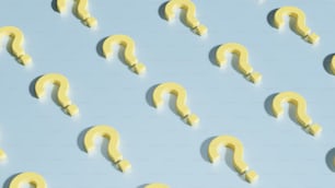 a group of yellow question marks on a blue background