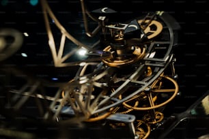 a close up of a clock with a black background