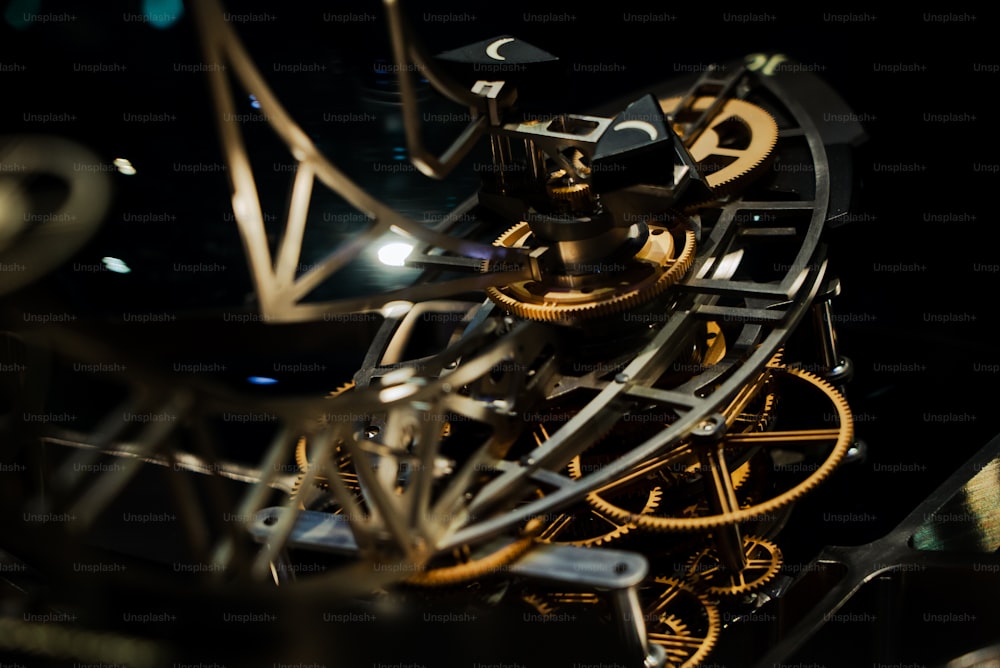 a close up of a clock with a black background