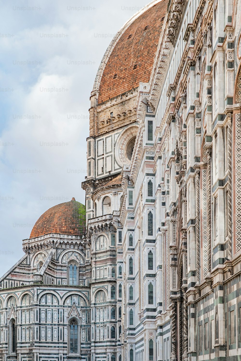 a large building with a clock on the side of it