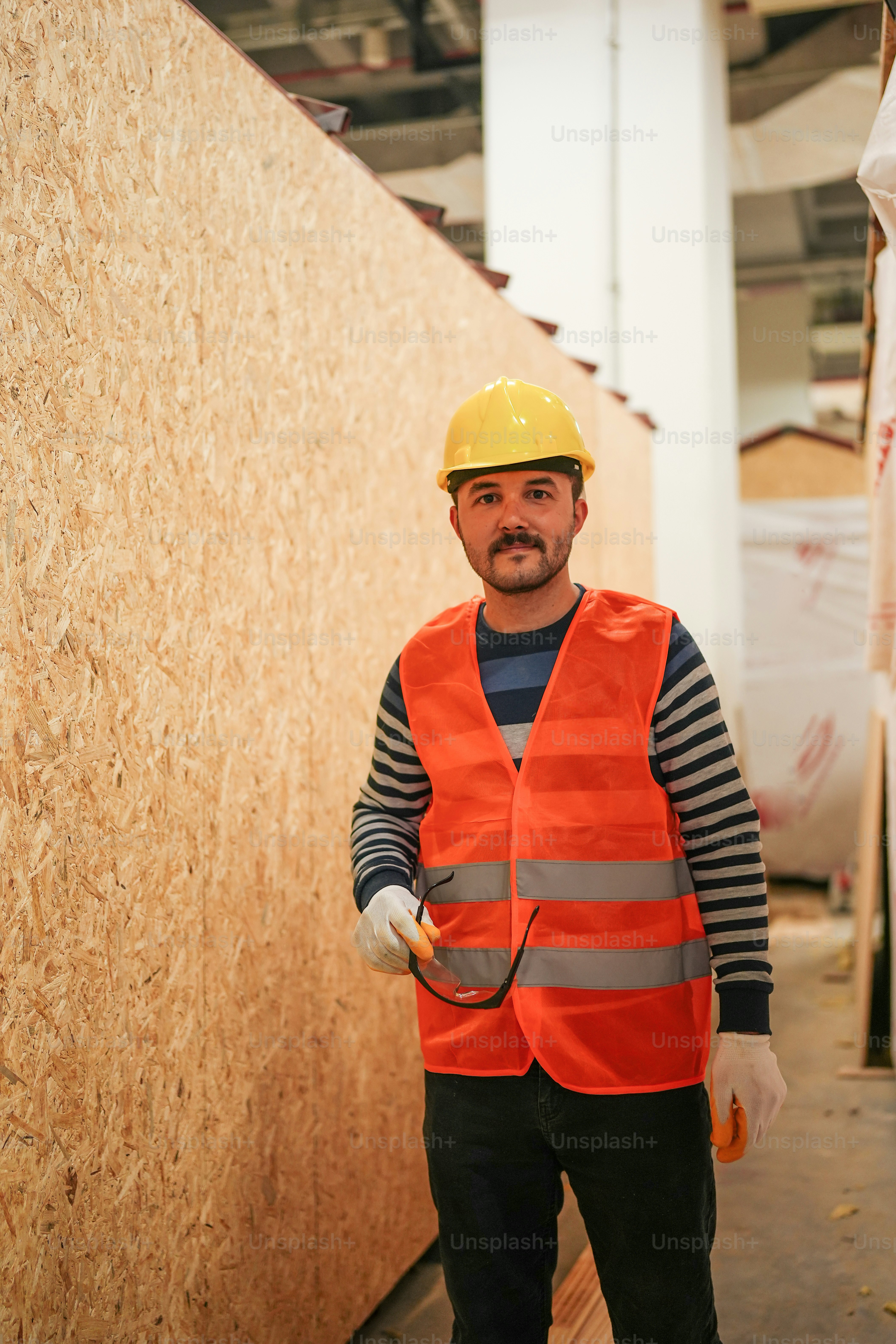 Construction worker in safety gear on a jobsite