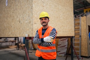 a man wearing a safety vest and a hard hat