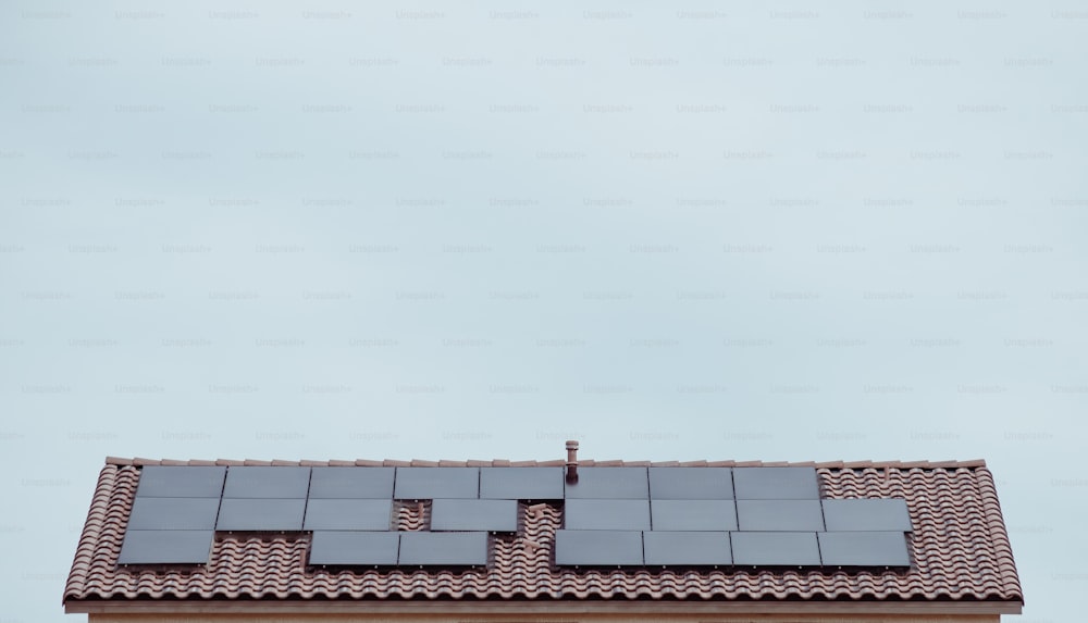 the roof of a building with a solar panel on it