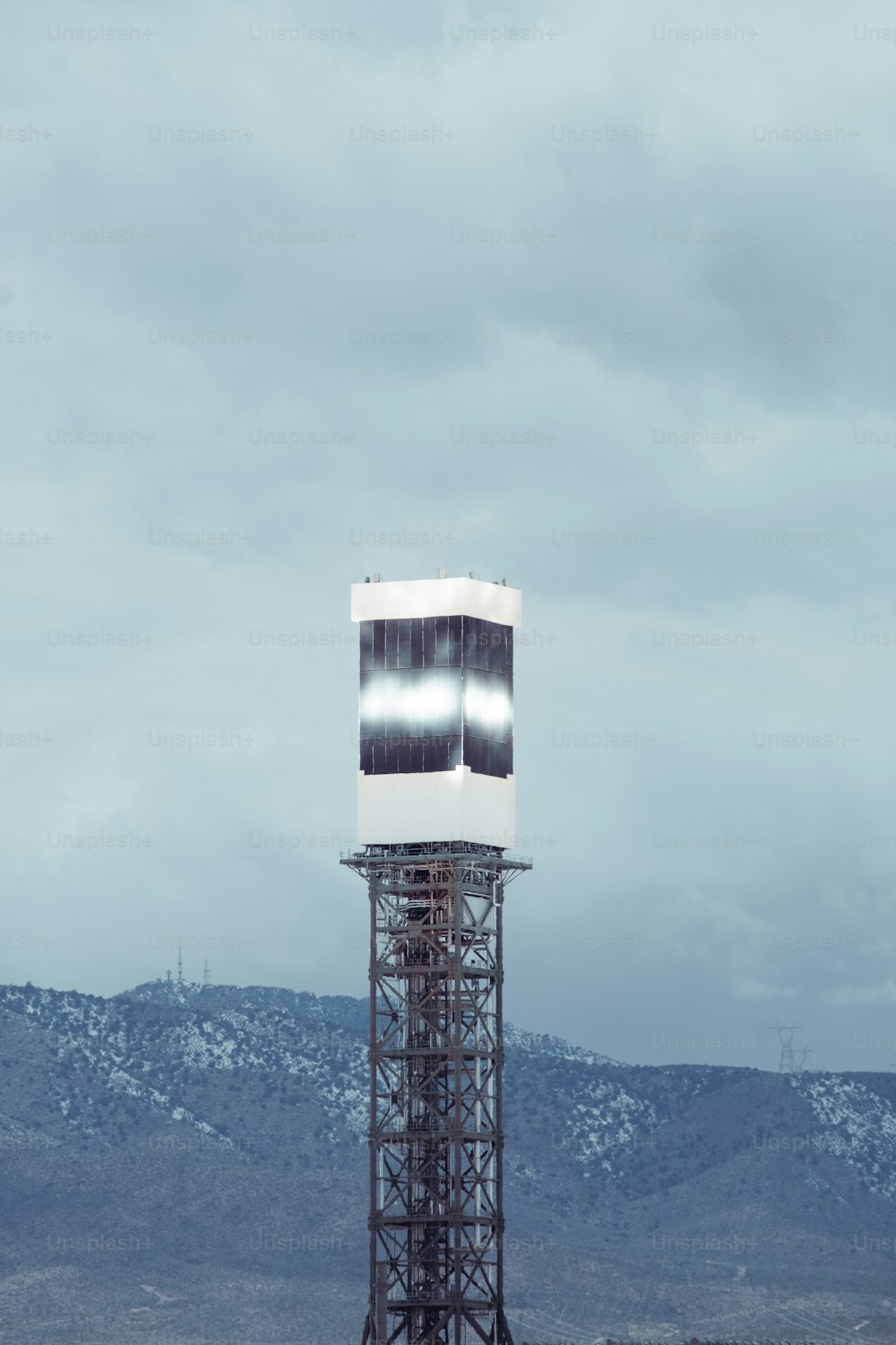 a tall tower with a light on top of it