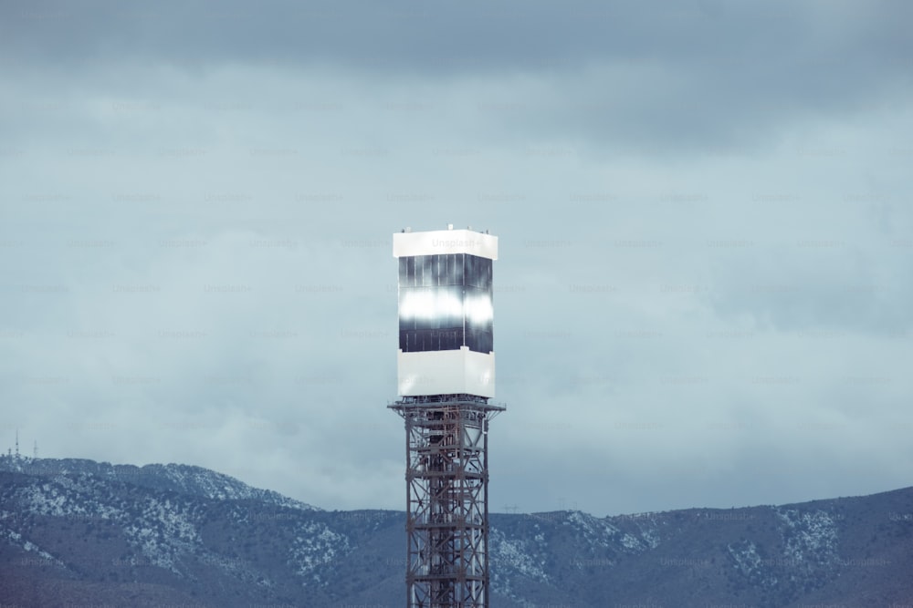 a tall tower with a clock on top of it