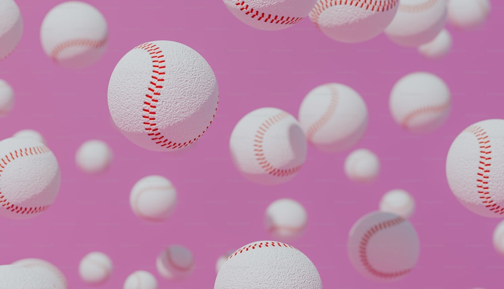 Un grupo de pelotas de béisbol volando por el aire