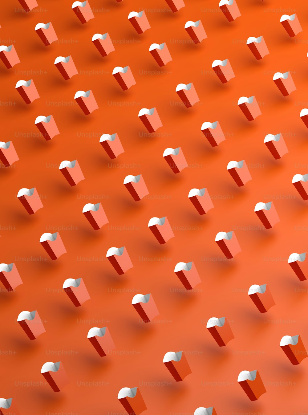 an orange background with a bunch of white objects