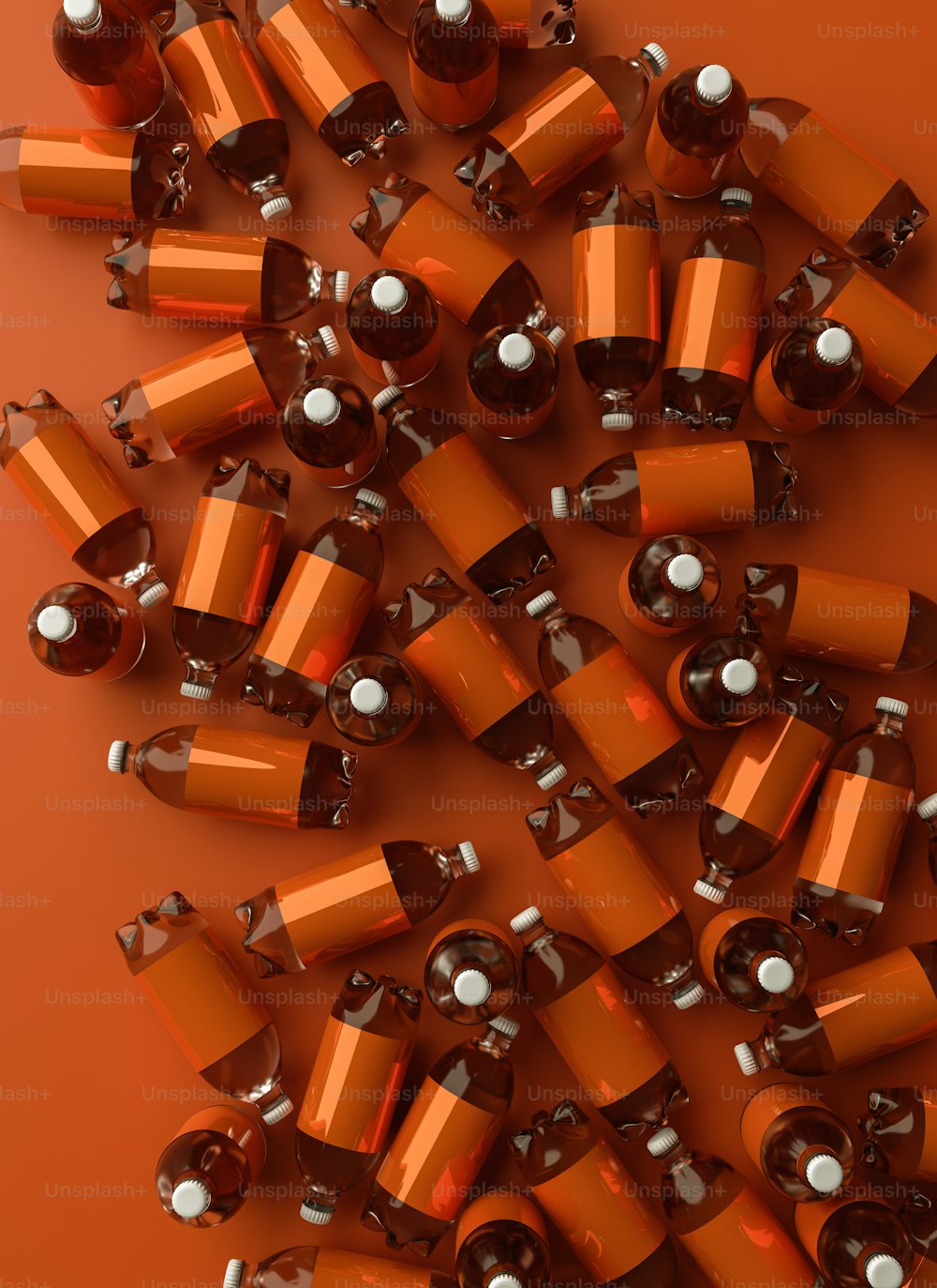 a pile of orange and silver batteries on a orange background
