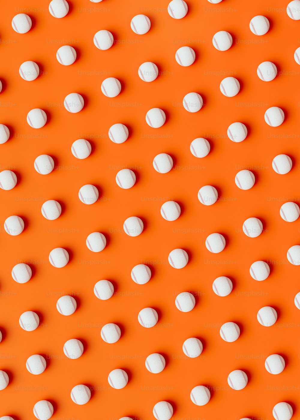 an orange background with white polka dots