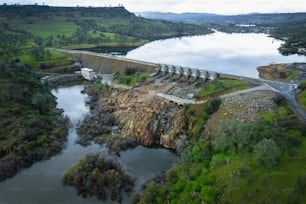 an aerial view of a dam in the middle of a river