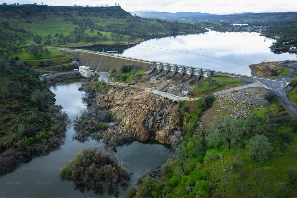 an aerial view of a dam in the middle of a river