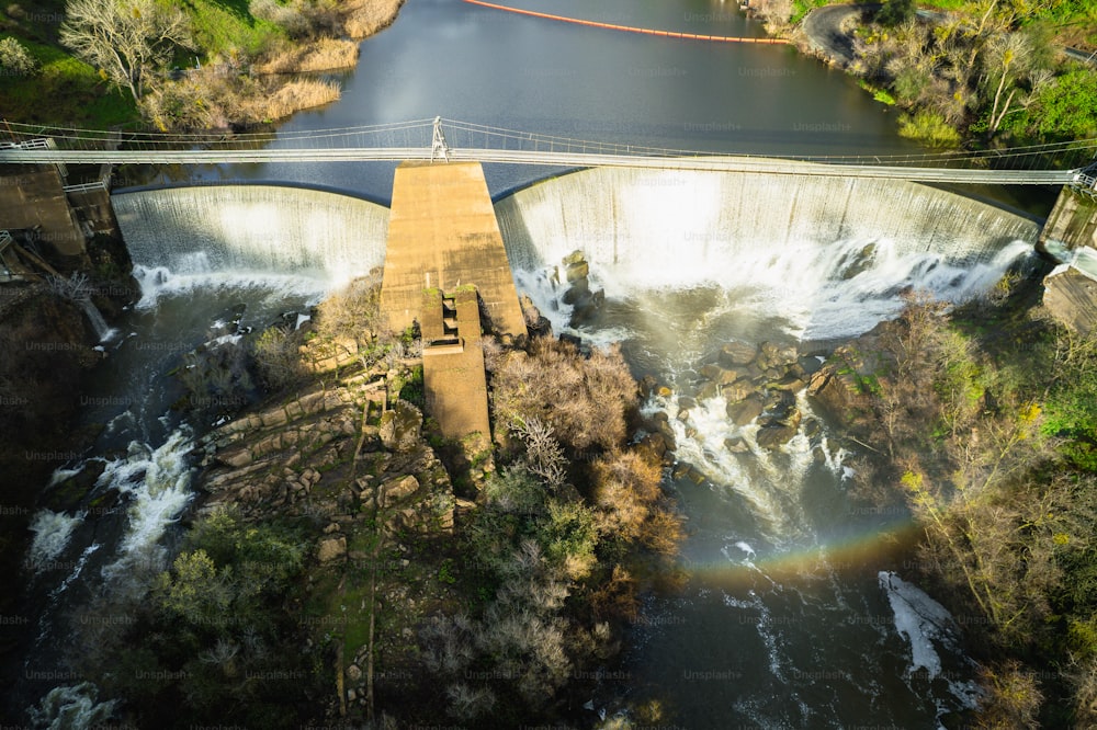 an aerial view of a bridge over a river