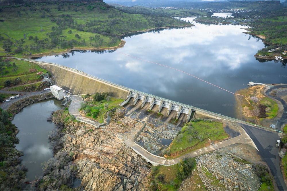 an aerial view of a dam and a body of water