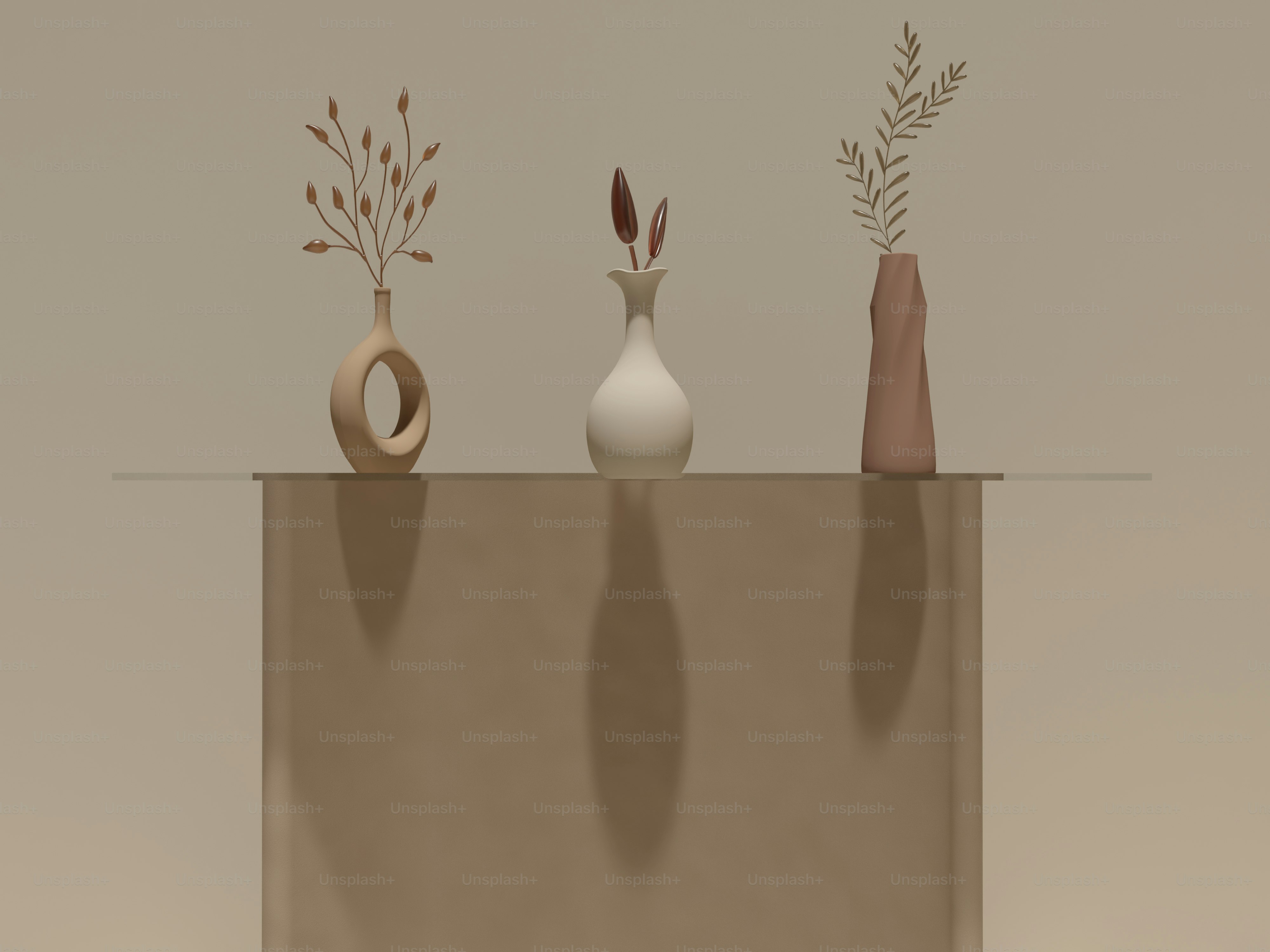 A group of three vases sitting on top of a table photo – Interior Image ...