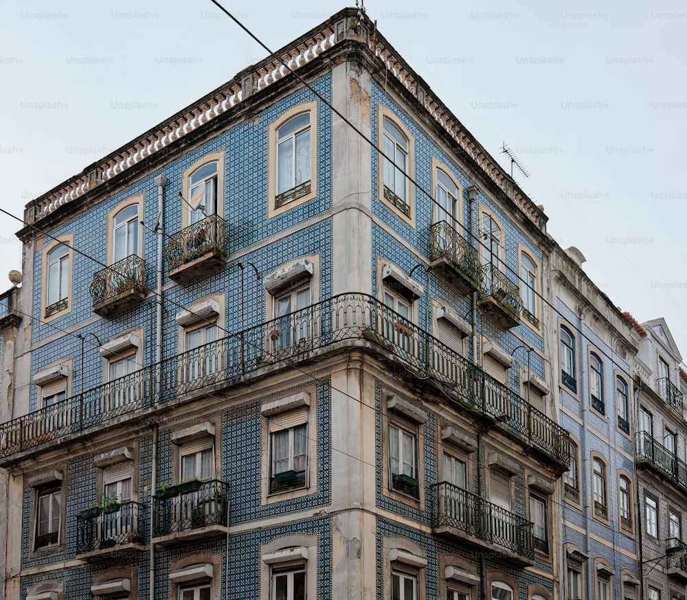 a tall building with balconies and balconies on the balconies