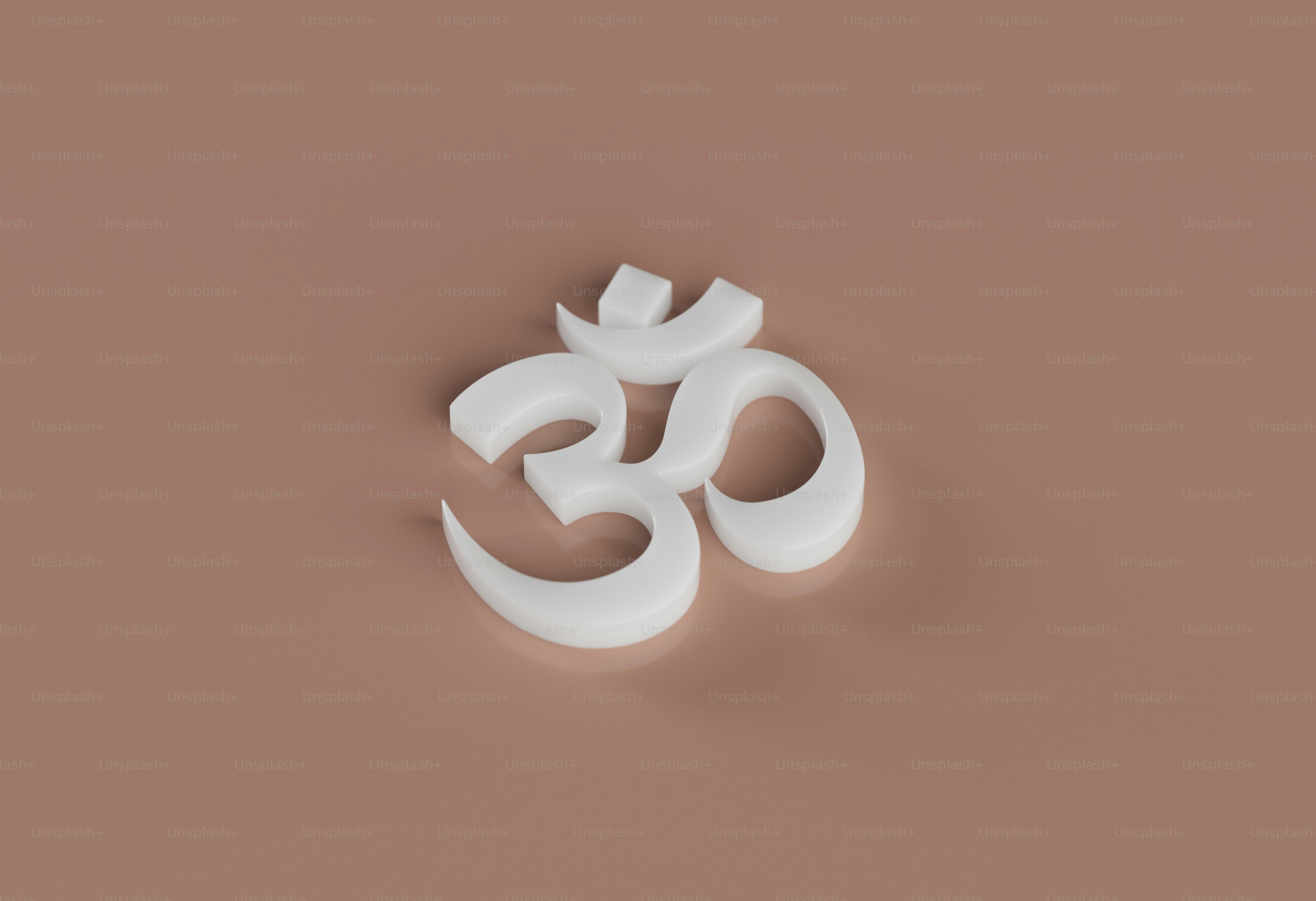 Un objeto blanco sobre un fondo marrón