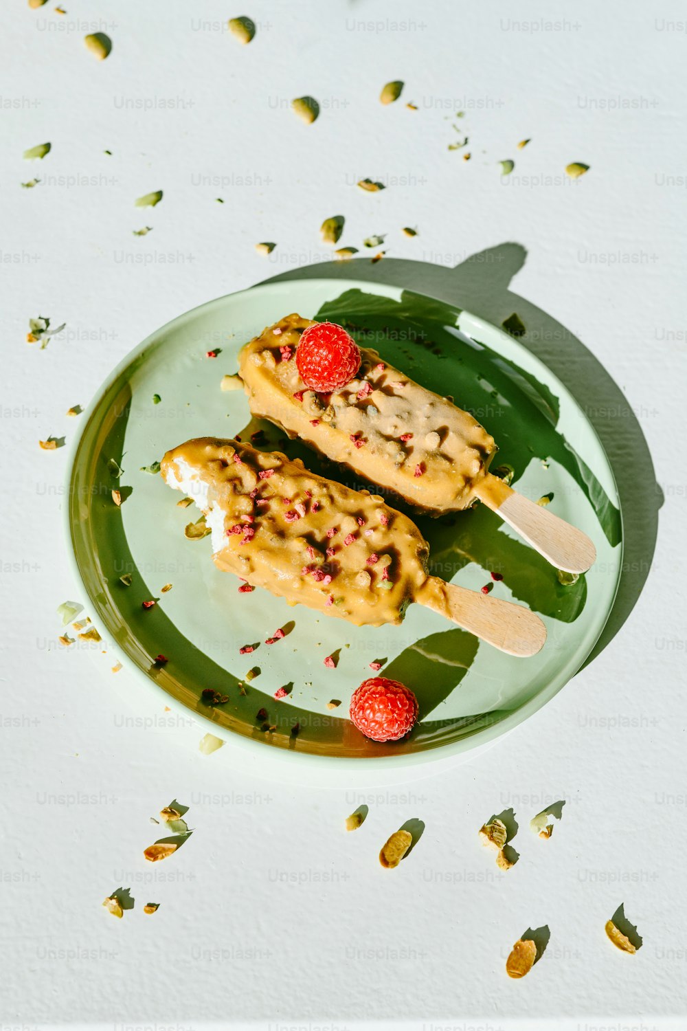 two pieces of food on a green plate