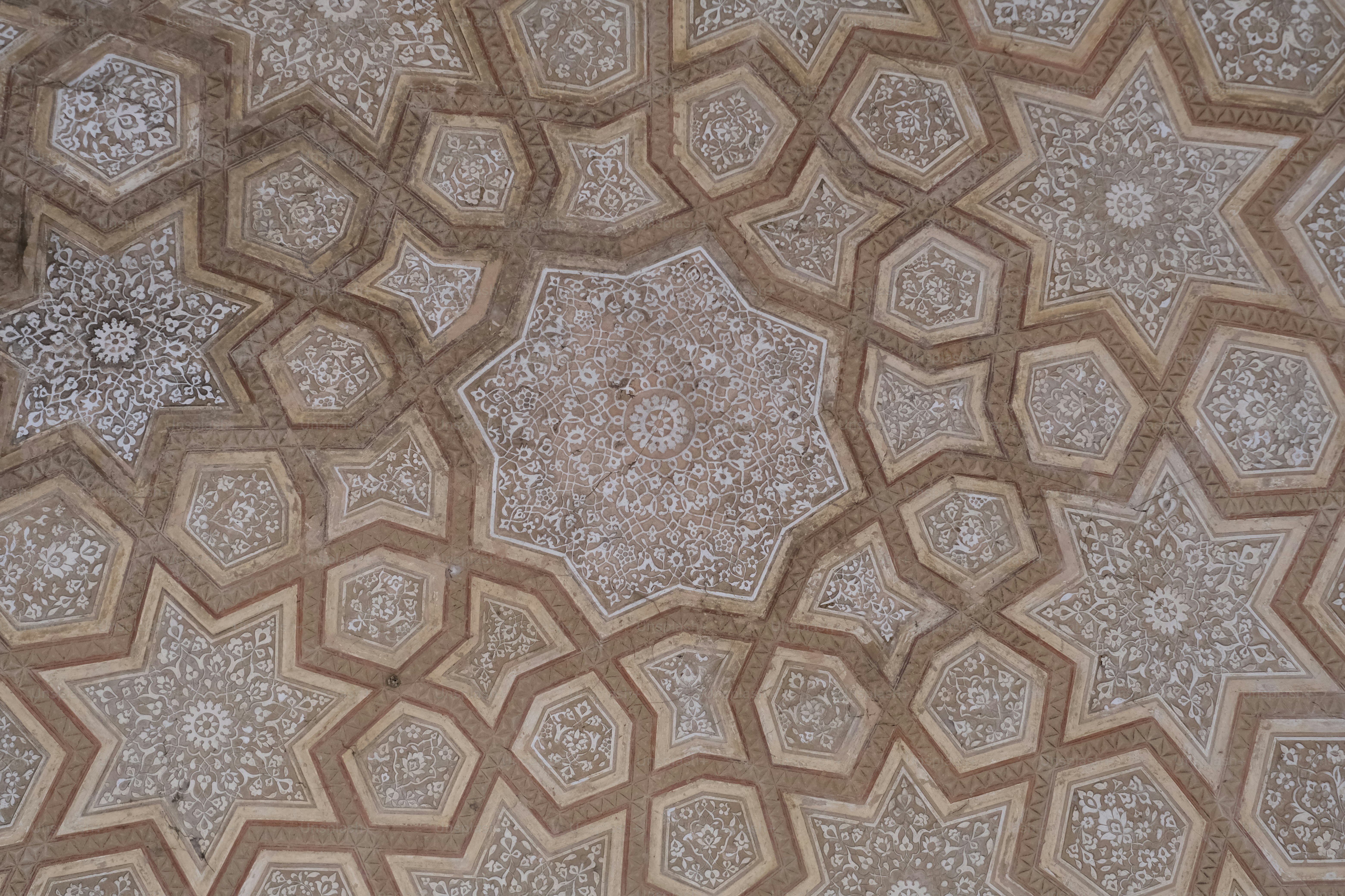 a close up of a pattern on a wall