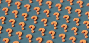 a group of orange question marks on a blue background