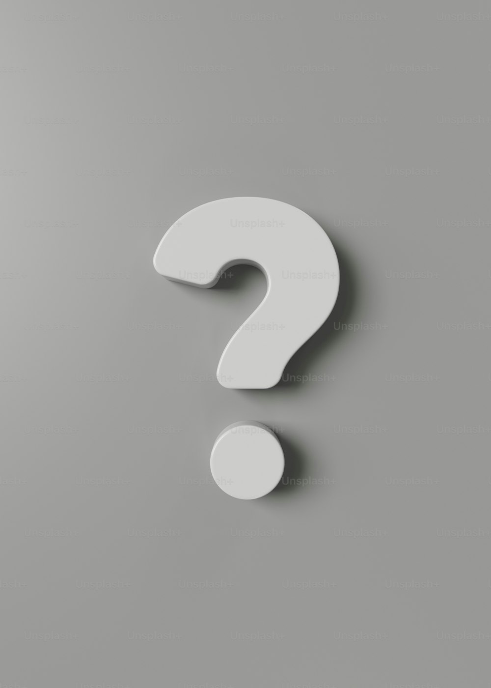 a white question mark on a gray background