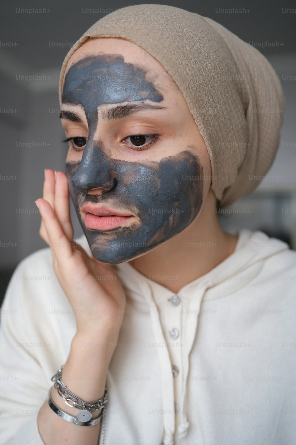 a woman with a blue face mask on