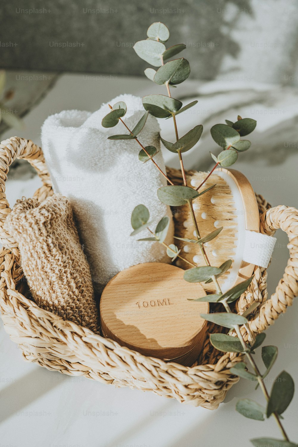 a basket filled with personal care items on a table