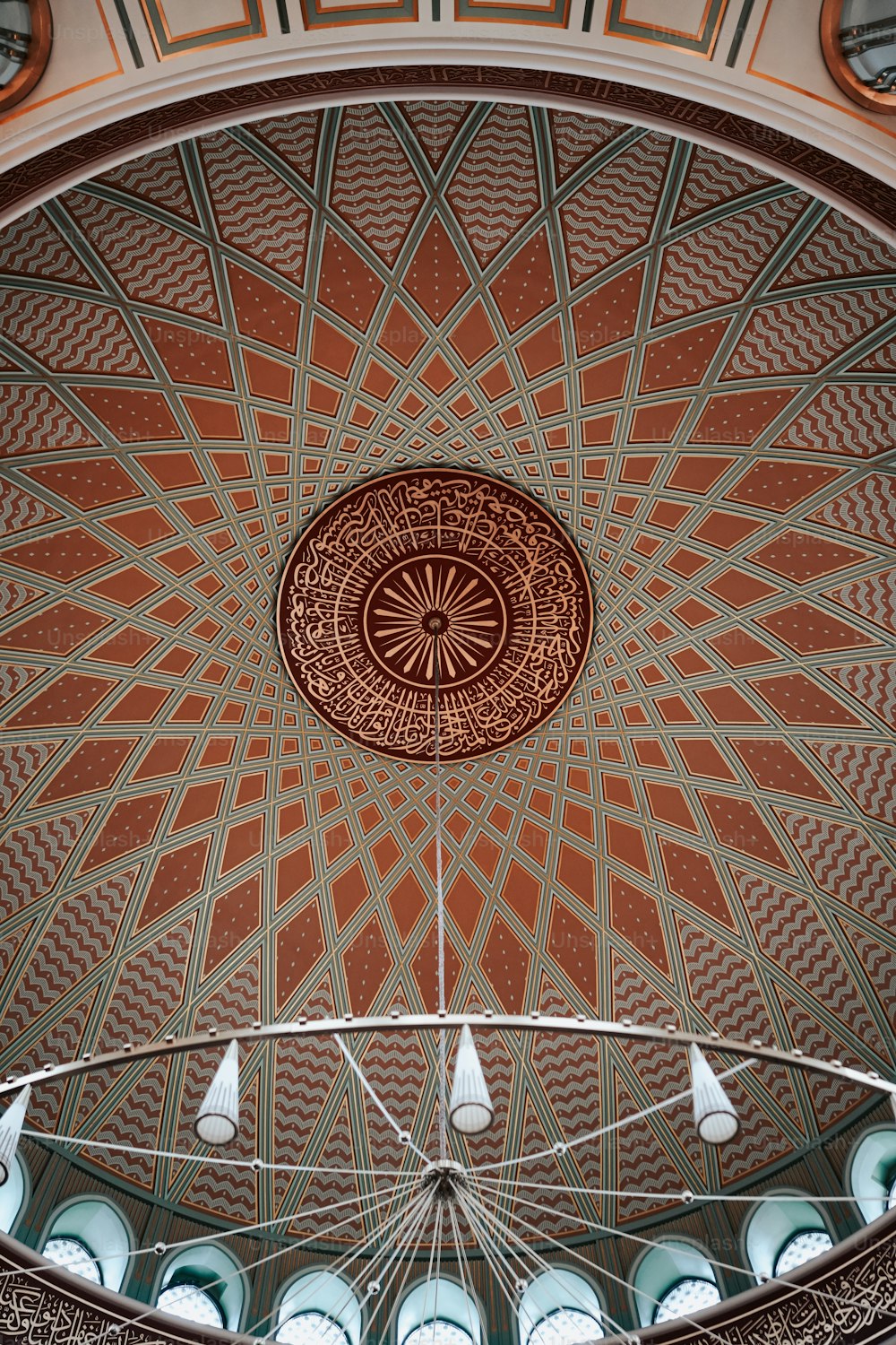 the ceiling of a building with a circular design