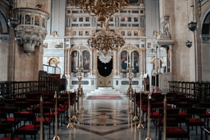 a church with a chandelier hanging from the ceiling