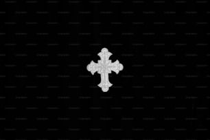 uma cruz branca em um fundo preto
