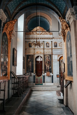 a church with paintings and paintings on the walls