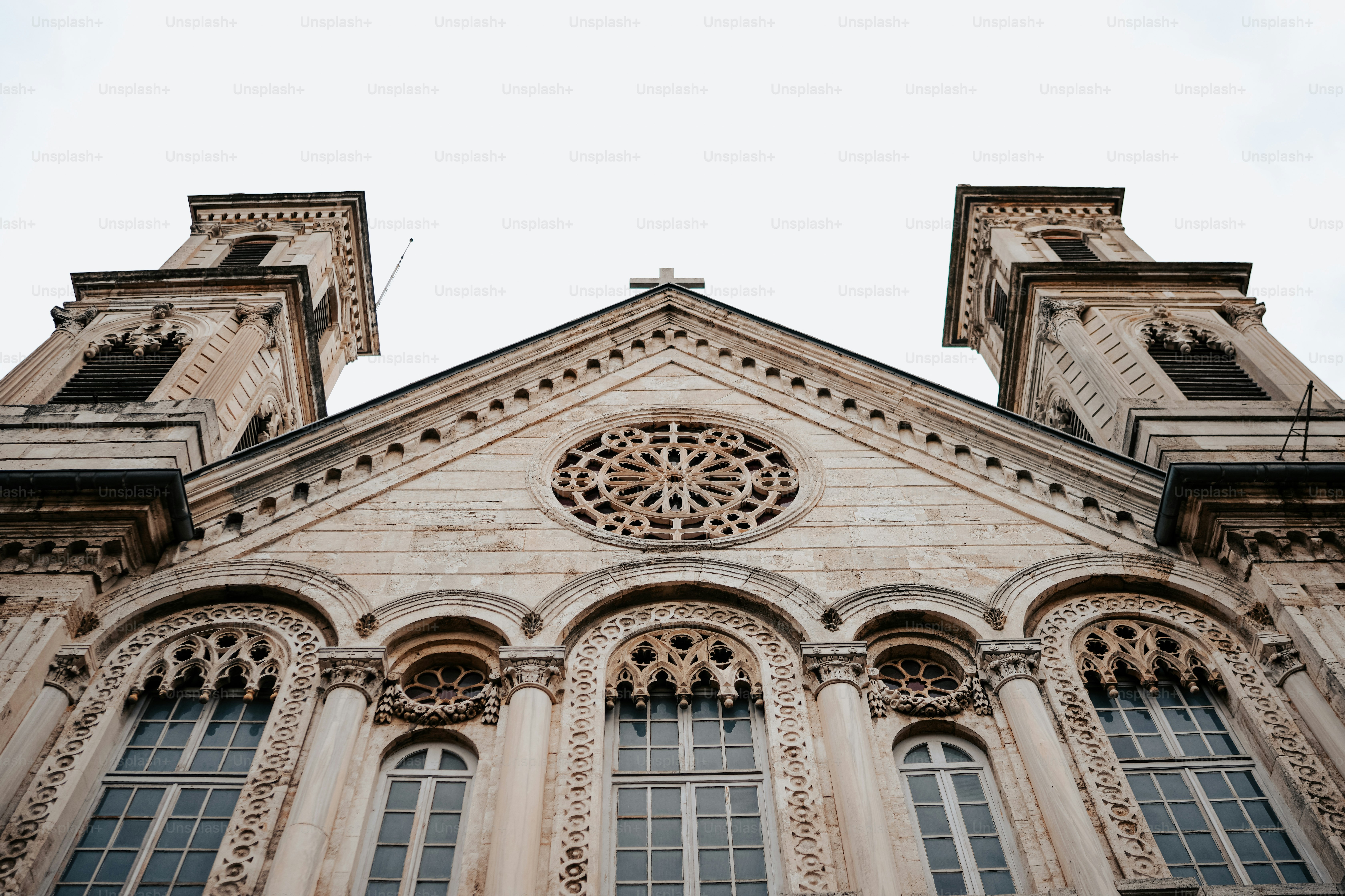 a tall building with a clock on the front of it