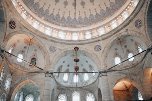 the inside of a large building with many windows