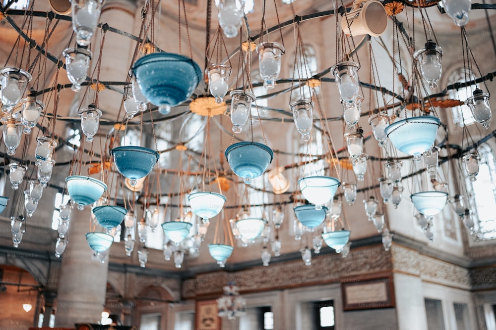 a chandelier hanging from the ceiling in a building