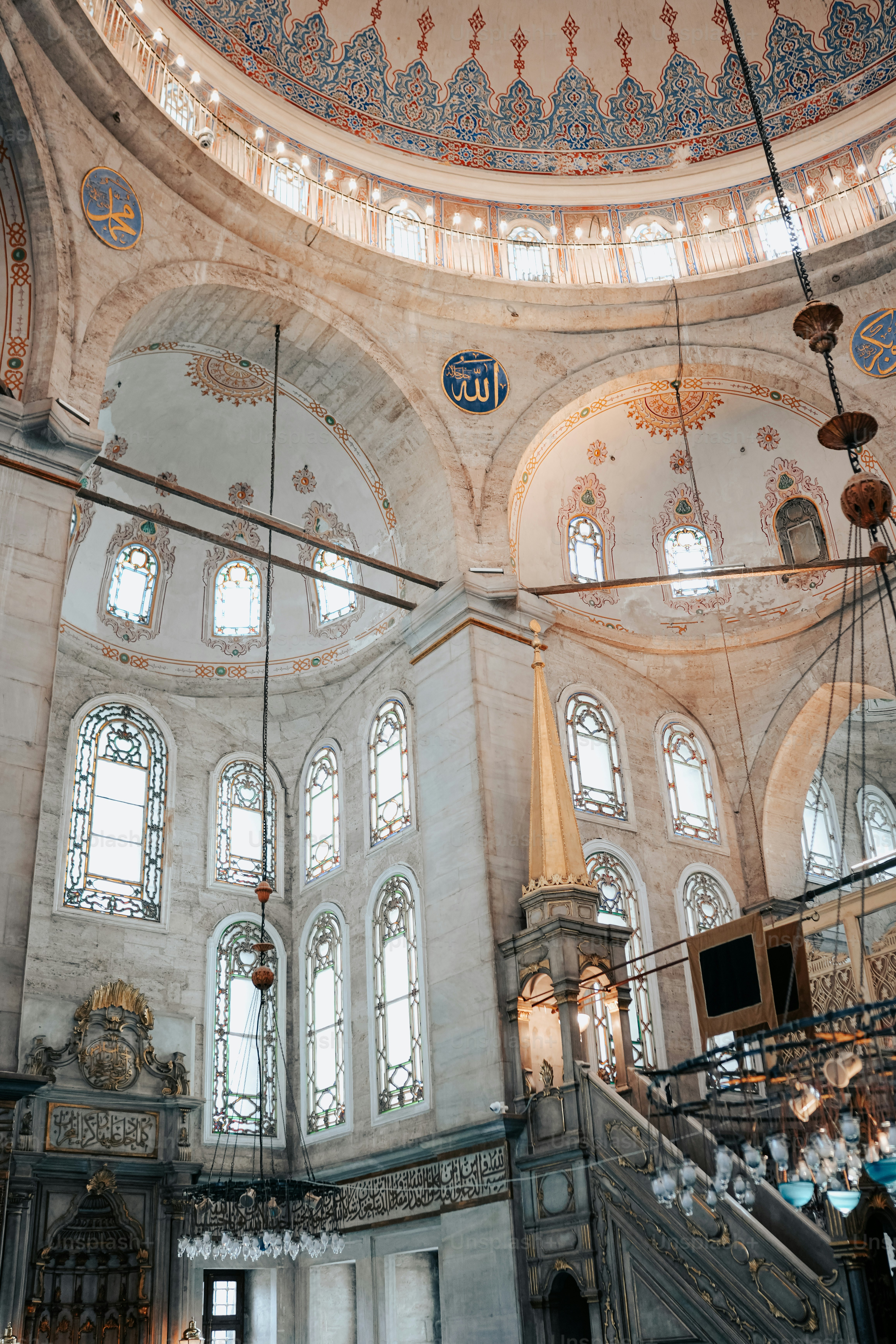 The inside of a large building with many windows photo – Interior ...