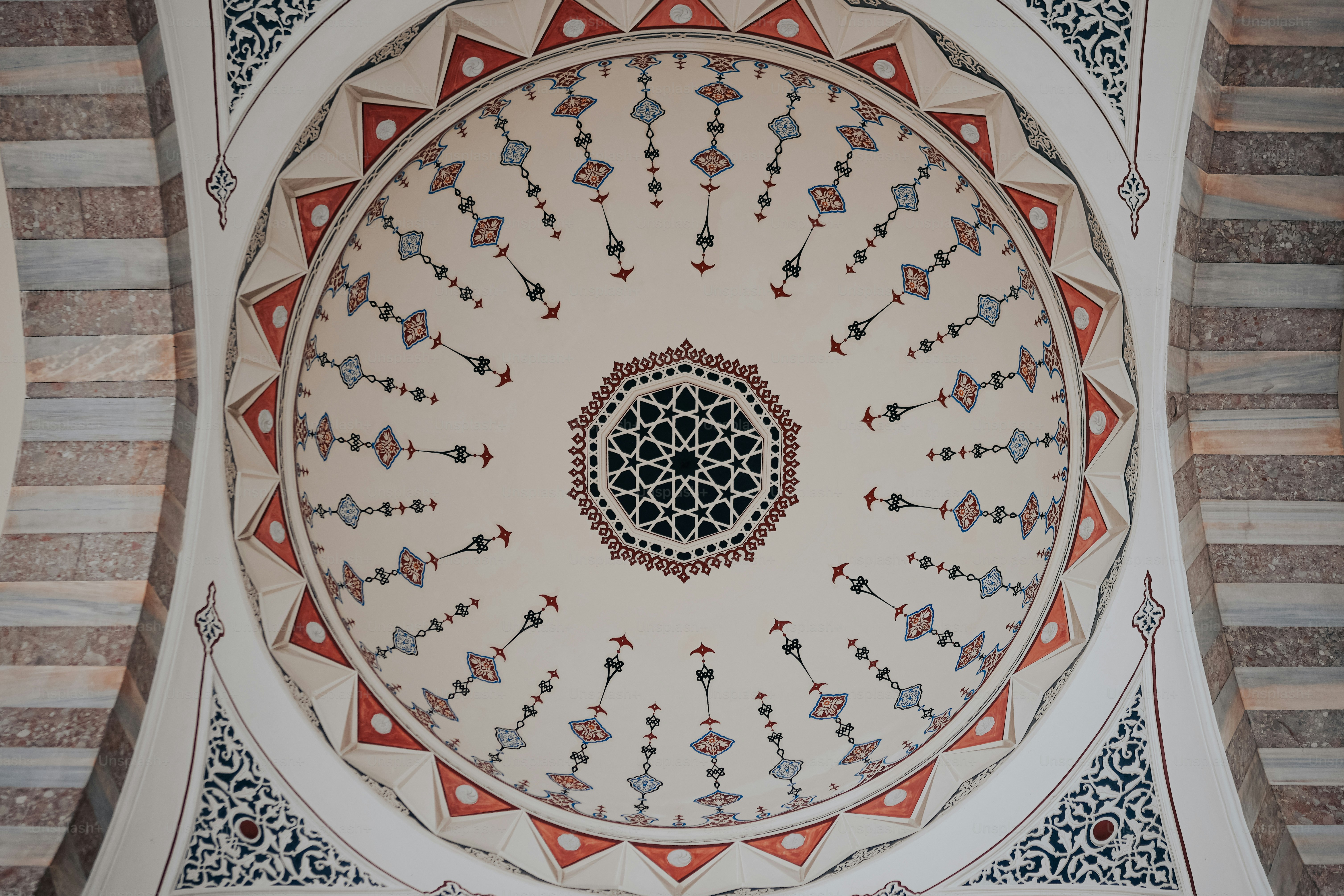 a ceiling with a circular design on it