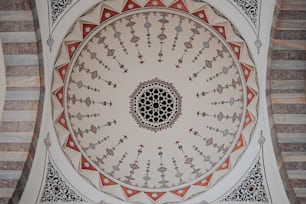 a ceiling with a circular design on it