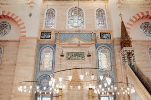 a chandelier hanging from the ceiling of a building