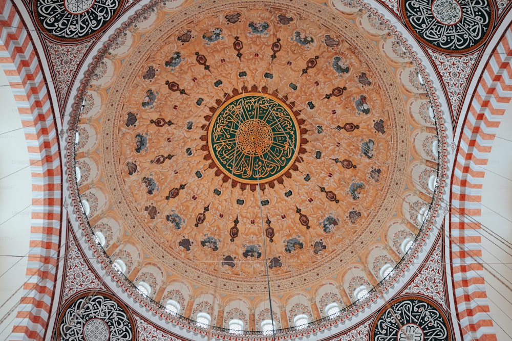 the ceiling of a building with a circular design