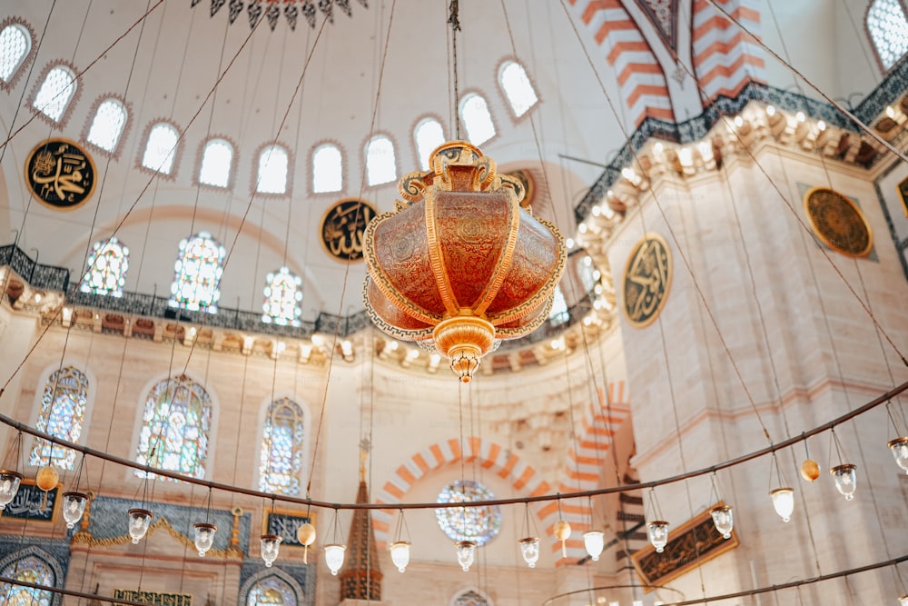 a chandelier hanging from the ceiling of a building