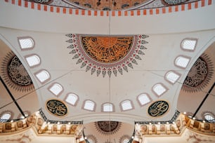 the ceiling of a building with intricate designs