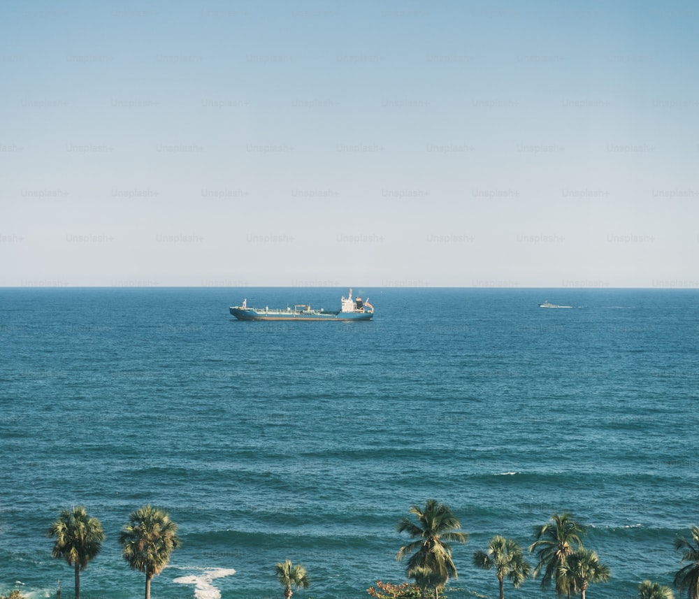 a large boat in the middle of the ocean