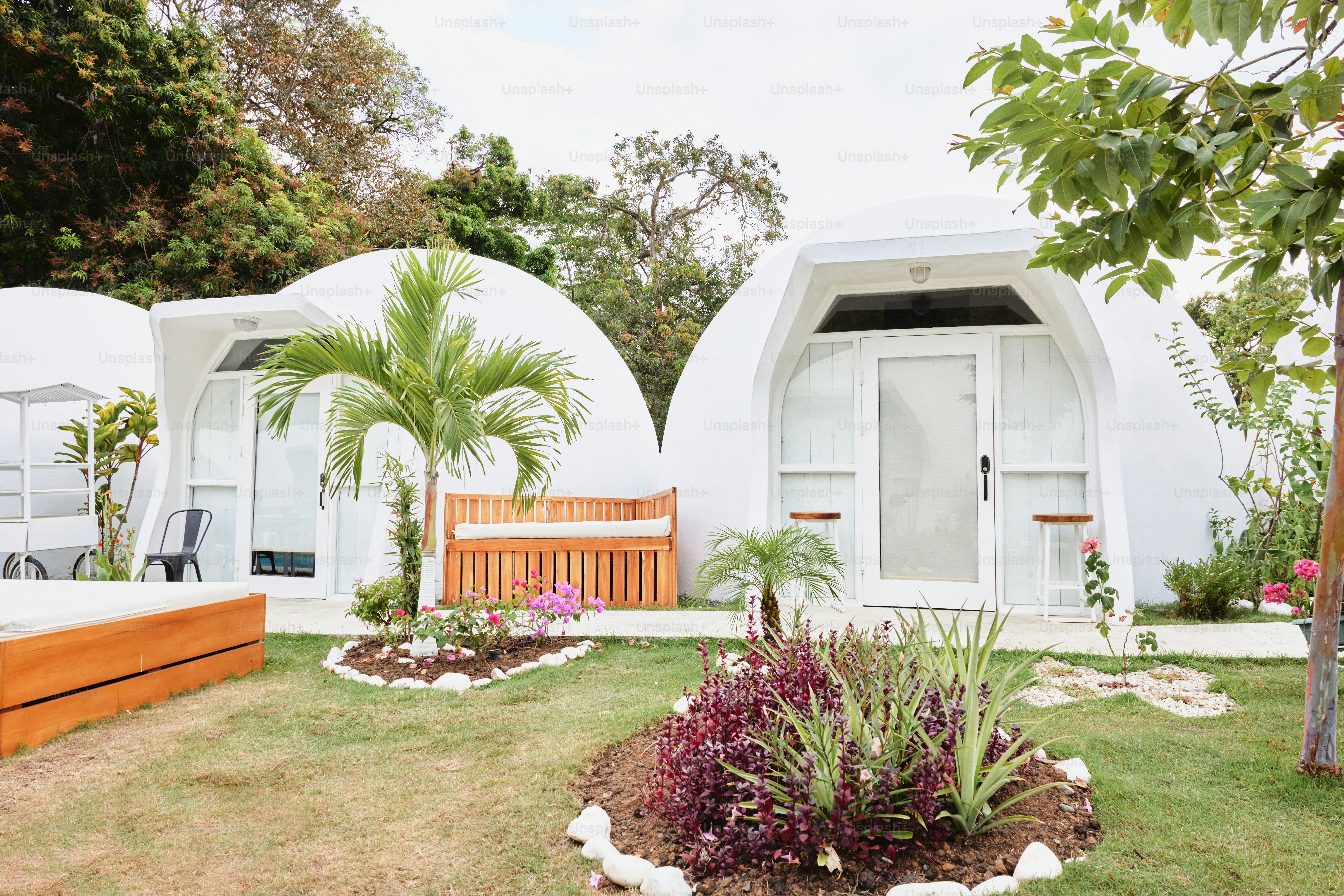 a couple of white buildings sitting next to each other