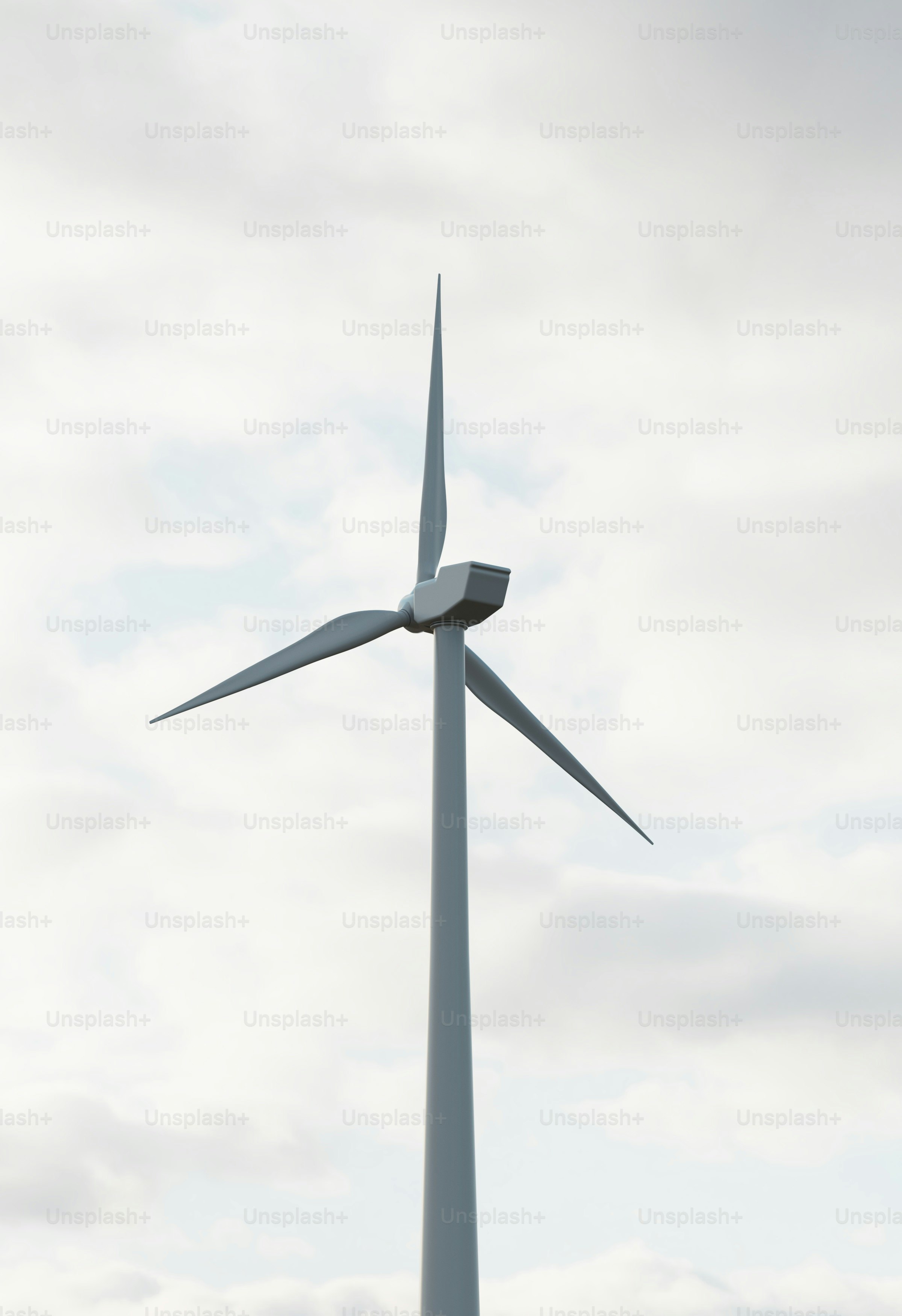 a wind turbine is shown against a cloudy sky