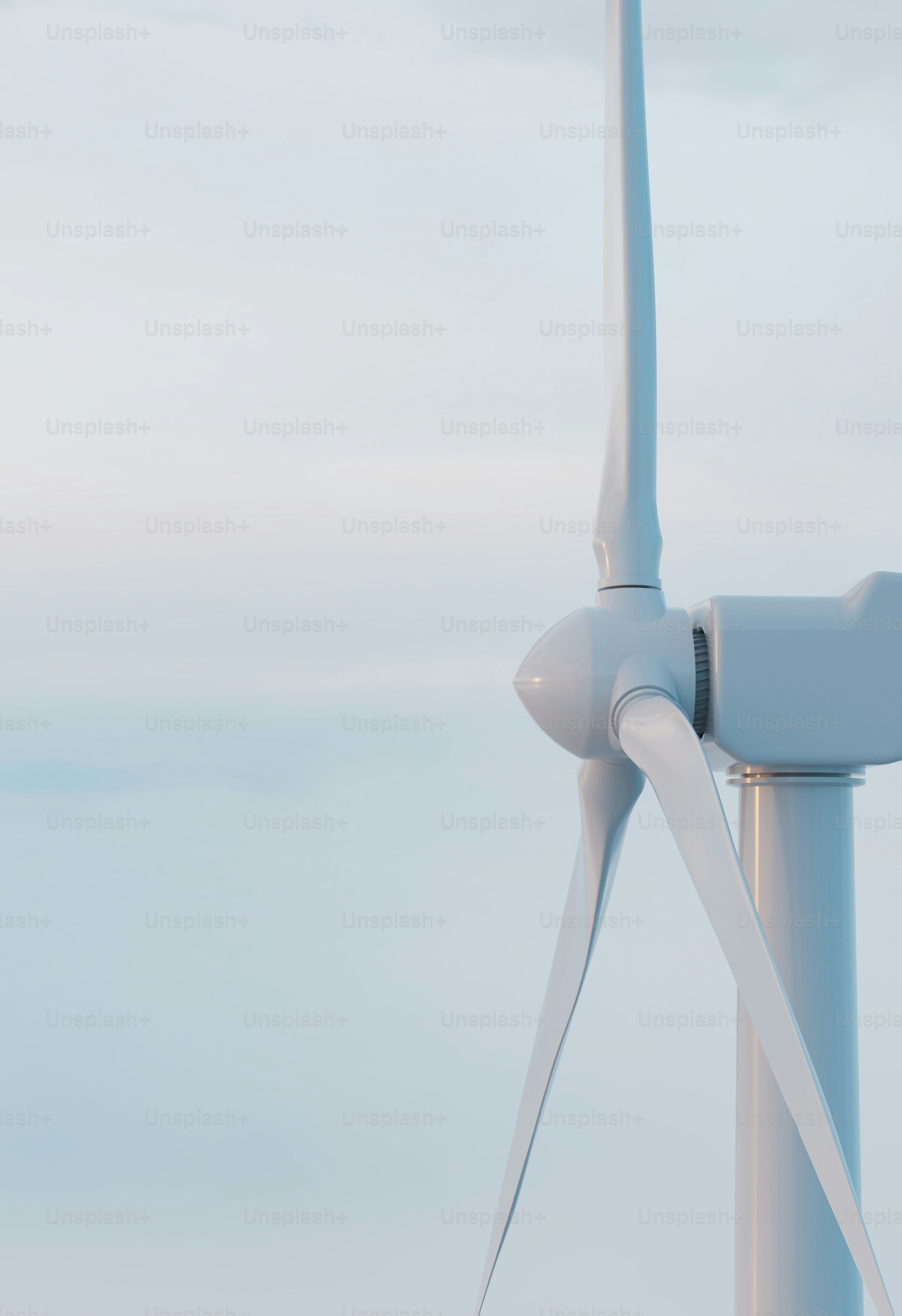 a close up of a wind turbine on a cloudy day