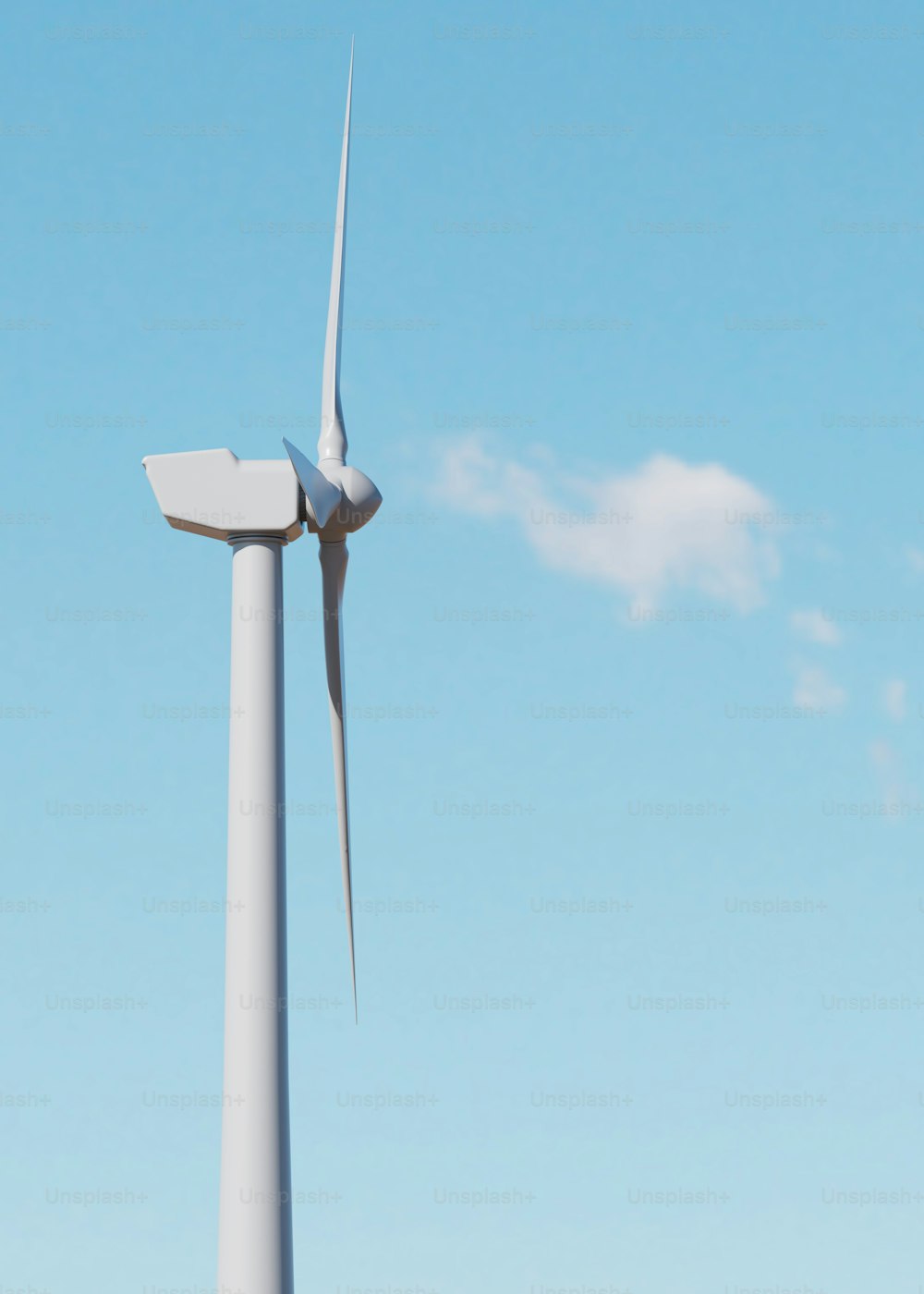 a wind turbine with a blue sky in the background