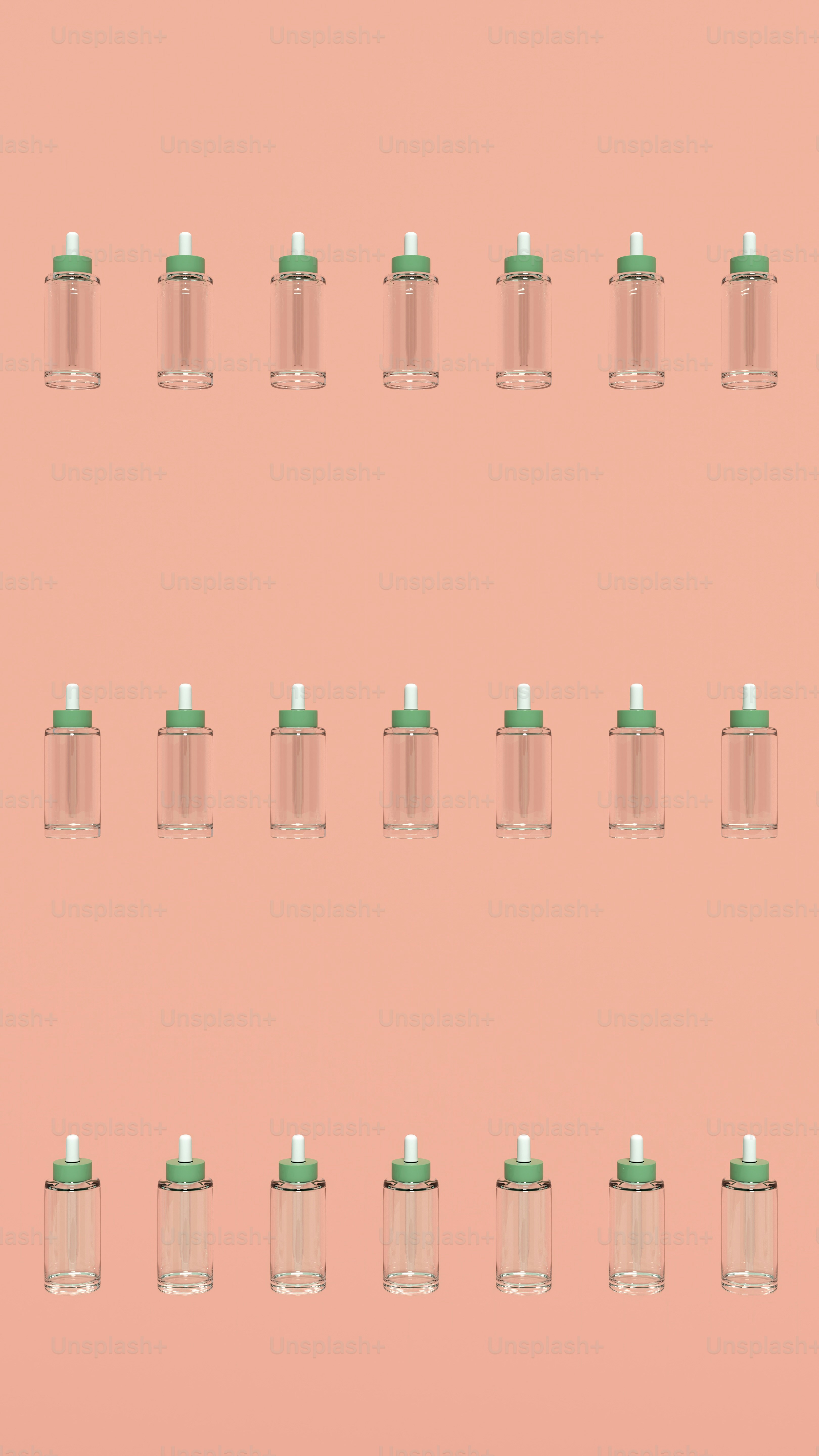 a group of glass jars with green lids