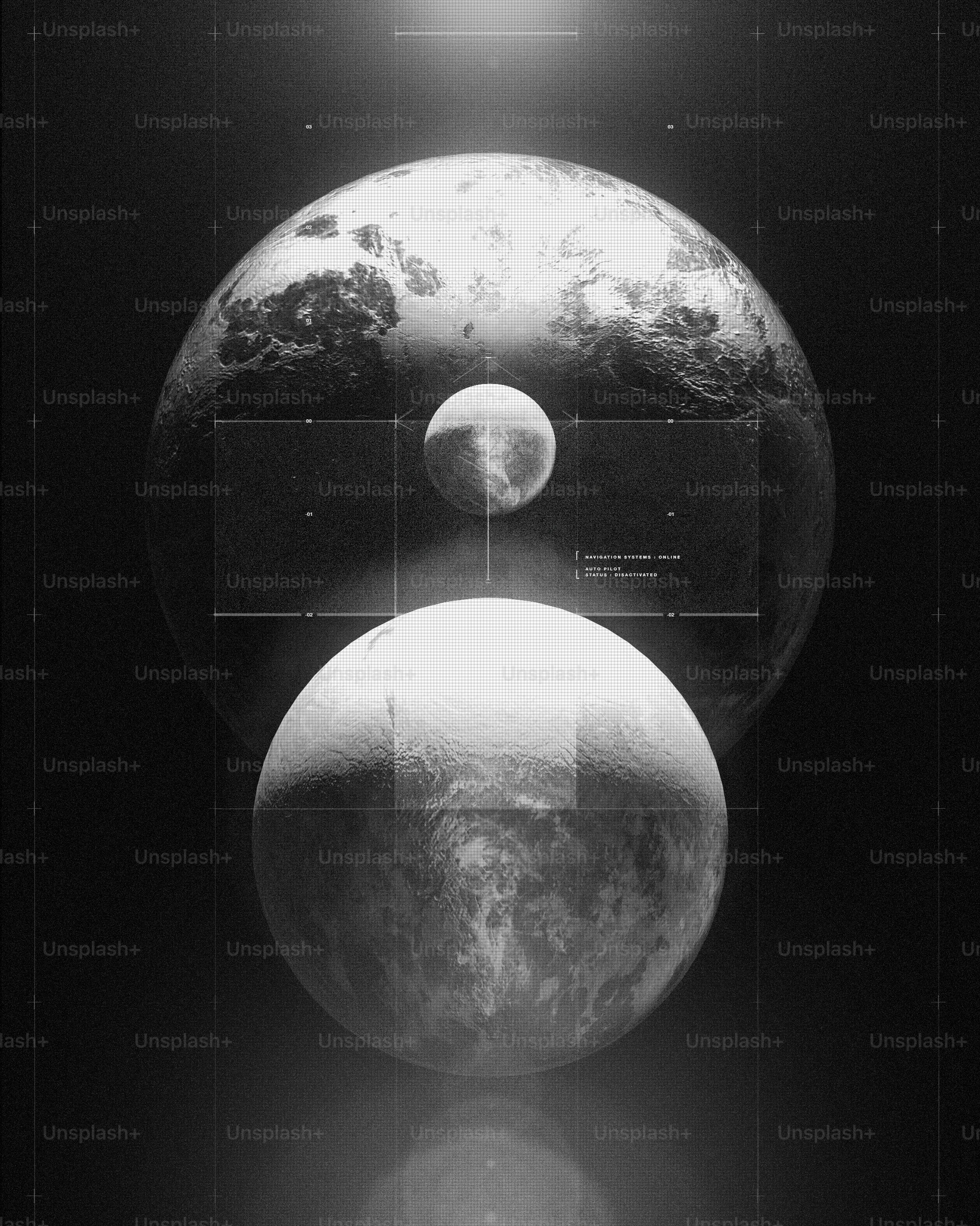 a black and white photo of two planets
