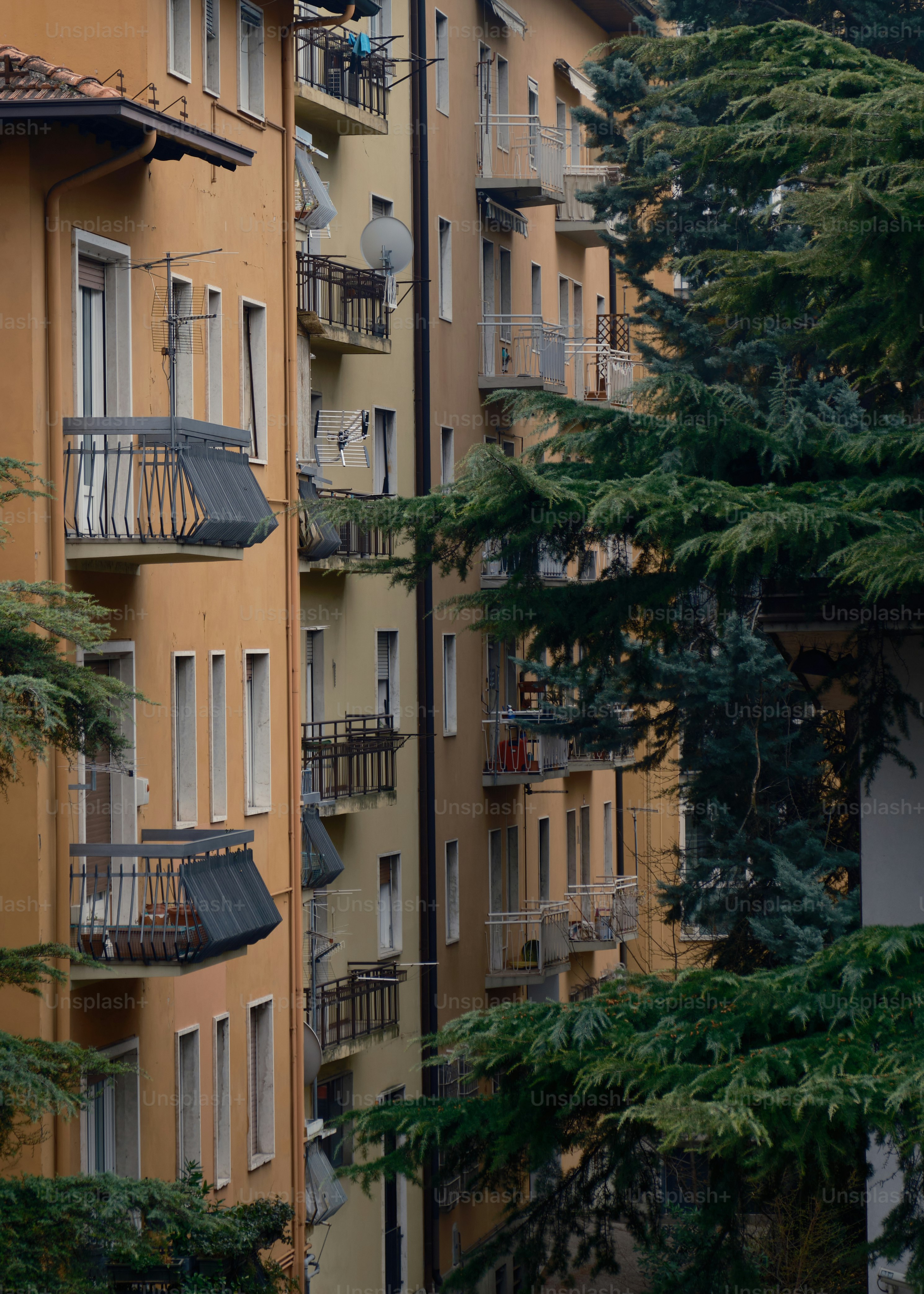 an apartment building with balconies and balconies on the balconies