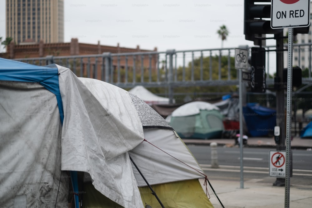 a group of tents sitting on the side of a road